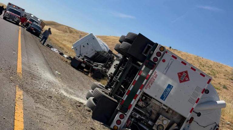 Hazmat crash shuts down I-5 near Patterson. Big rig overturns