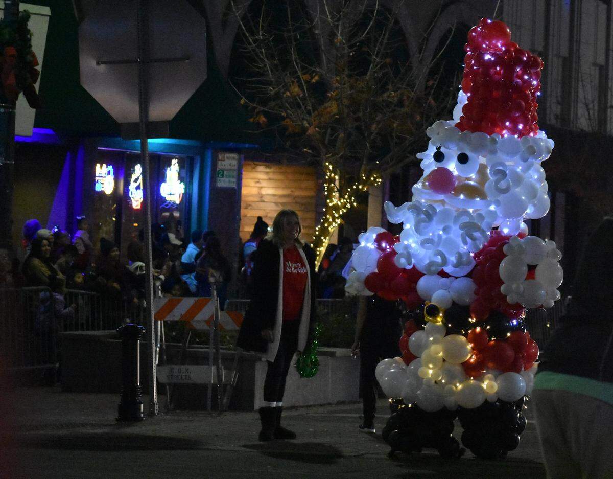 The Celebration of Lights Parade made its way along the streets of downtown Modesto on Saturday night, Dec. 2, 2023, to the theme Toys, Trains and Candy Canes.