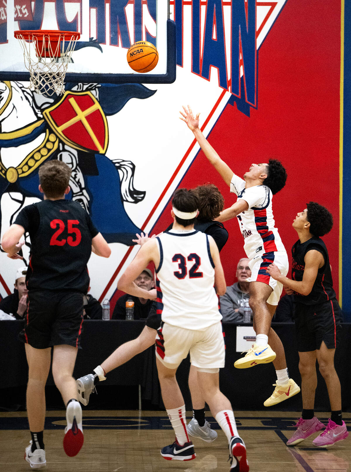 Modesto Christian’s Myles Jones scores on a layup during the Holiday Hoop Classic championship game with Buchanan at Modesto Christian High School in Salida, Monday, Dec. 30, 2024.