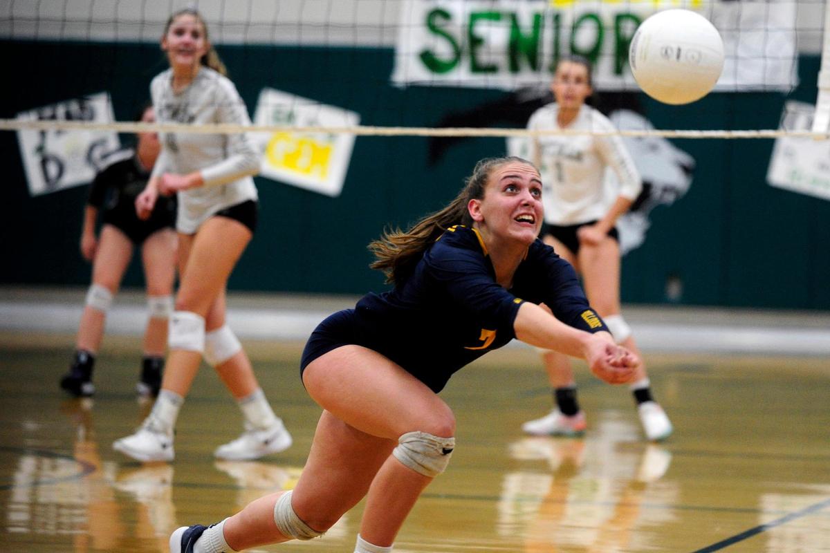 Turlock’s Mary Padilla (7) attempts to keep the ball in play, during the senior night, crosstown volleyball matchup of Turlock High at Pitman High, on Monday, Oct., 15 in Turlock, California.