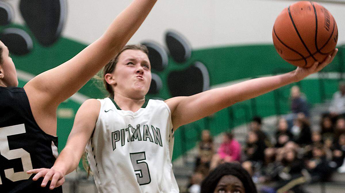 Pitman’s Sydney Smith scores during the Central California Athletic League game with Enochs at Pitman High School in Turlock, Calif., Tuesday, Jan. 8, 2019.