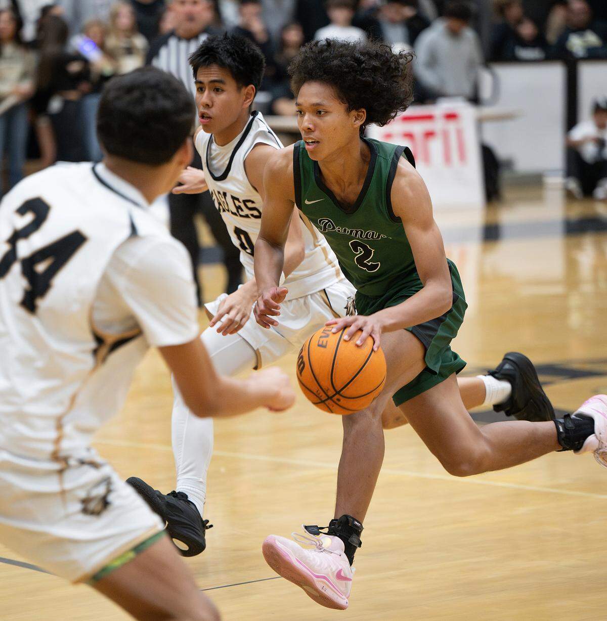 Pitman’s Cole Martin advances the ball up the court during the Central California Athletic League game with Enochs at Enochs High School in Modesto, Friday, Jan. 24, 2025.
