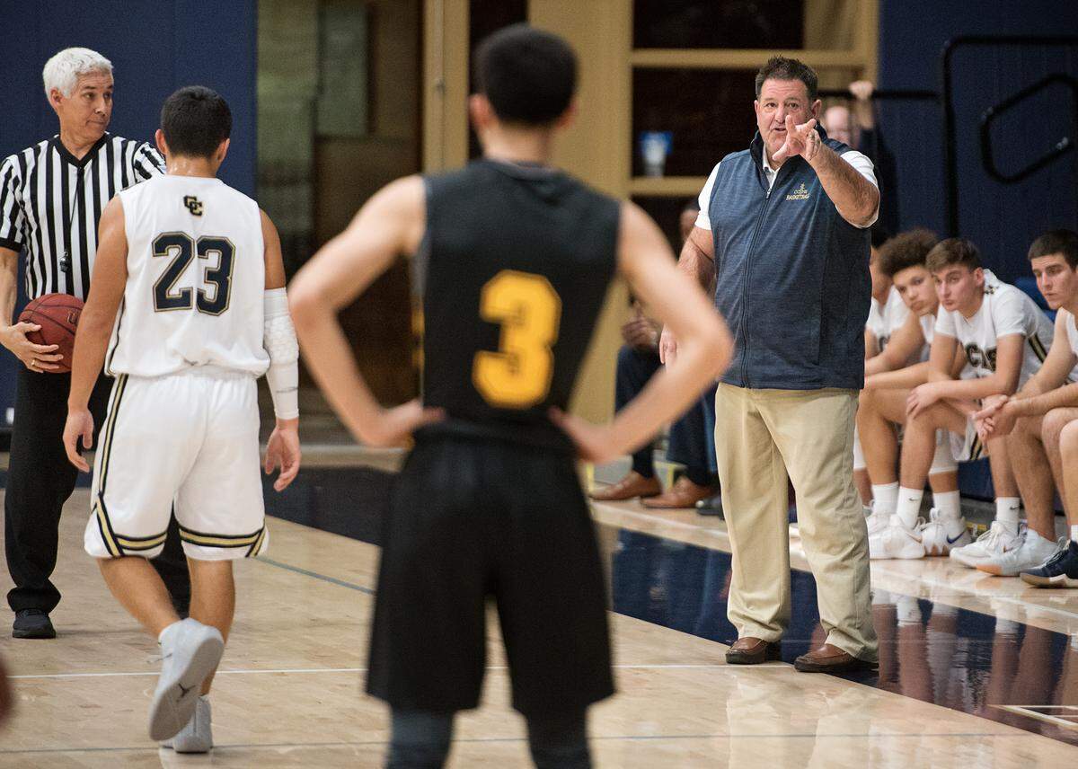 Central Catholic coach Mike Wilson directs his team during the 2018 Mark Gallo Invitational at Central Catholic High School in Modesto, Calif., Wednesday, Dec. 12, 2018. Central Catholic won the game 53-39.