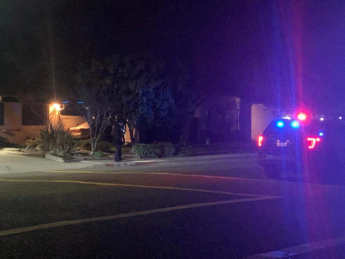 Turlock police investigate the scene of a crash at North Quincy Road and Arbor Way following a fatal shooting Tuesday March 8, 2022.