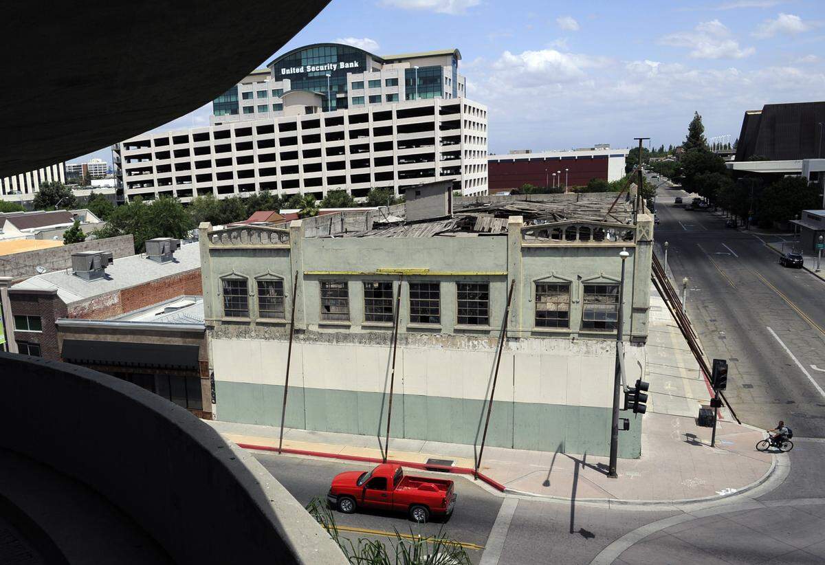 The exterior walls of the Droge building in downtown Fresno were propped up by steel braces before the building was demolished.