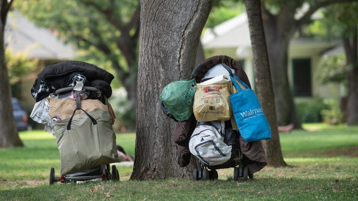 Personal items of the homeless are parked at Graceada Park in Modesto, Calif., on Friday, Sept. 10, 2021.