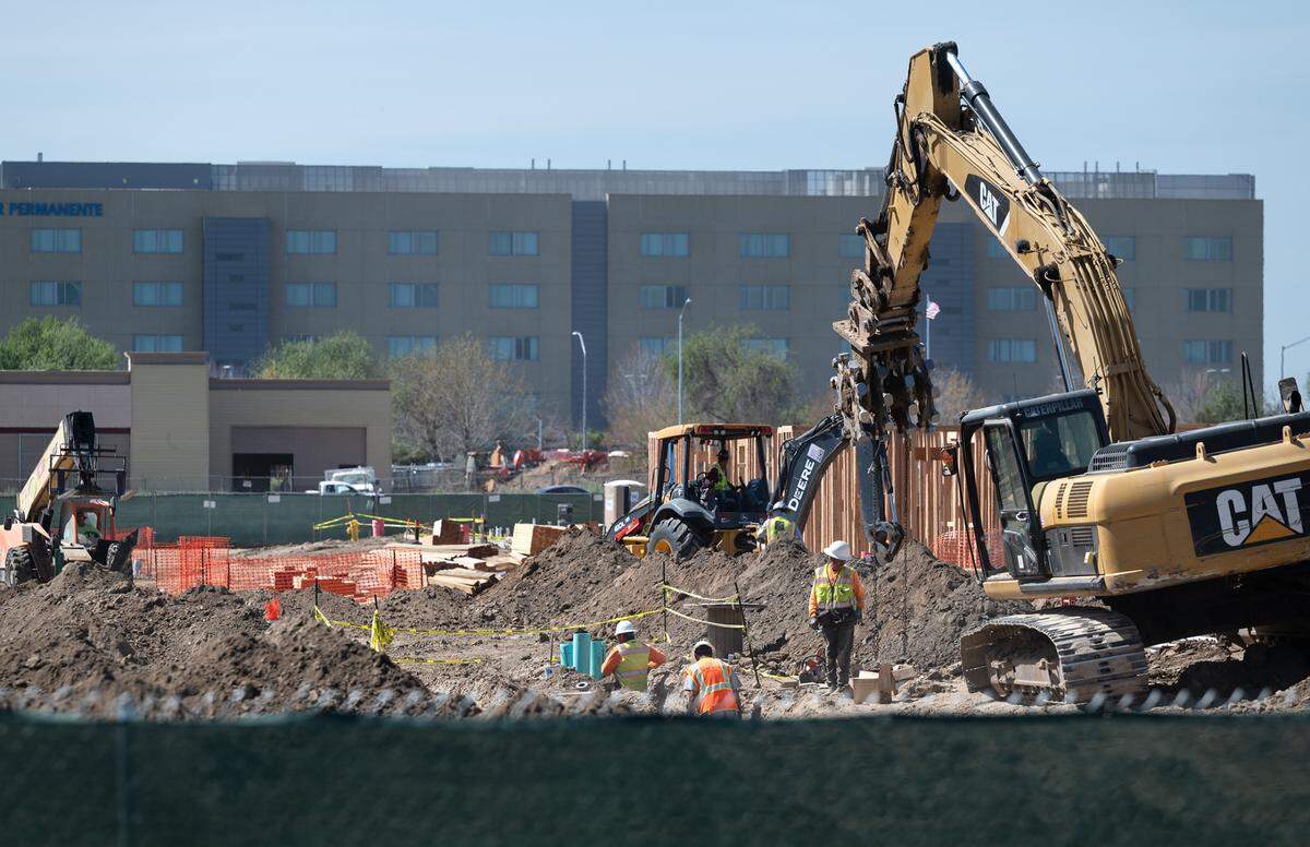 Construction of an apartment complex is underway across from Kaiser Medical Center on Dale Road in Modesto, Calif., on Thursday, March 24, 2022.