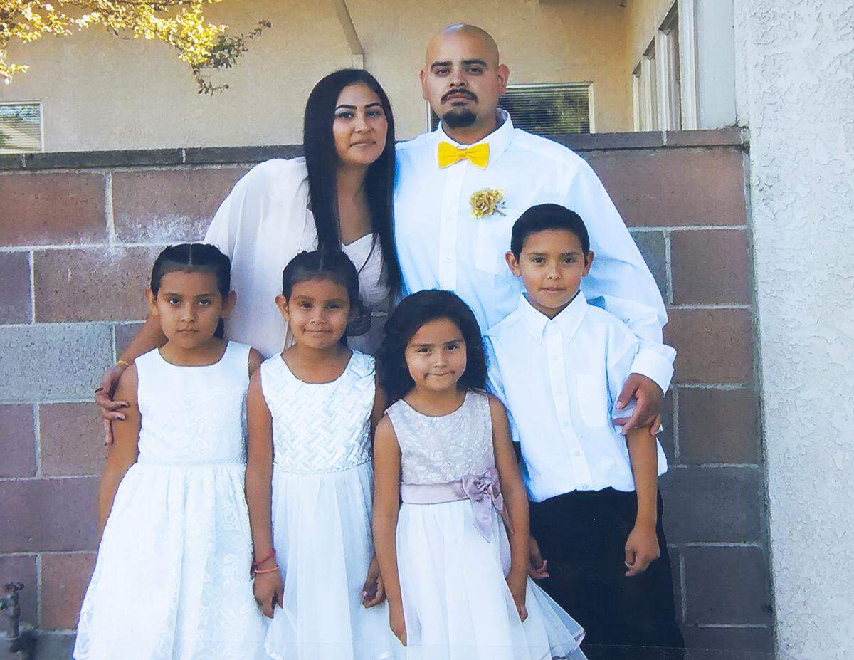 Pedro Gil, 31 of Vernalis, was one of two bystanders killed when a suspects in a stolen vehicle crashed into the Taco Vallarta taco truck stand during a police pursuit in Modesto, Calif. Picture clockwise from top left: Lisa and Pedro Gil and their children Pedro Jr., 12; Isabel, 8; Angelica, 9; and Arlene, 10.