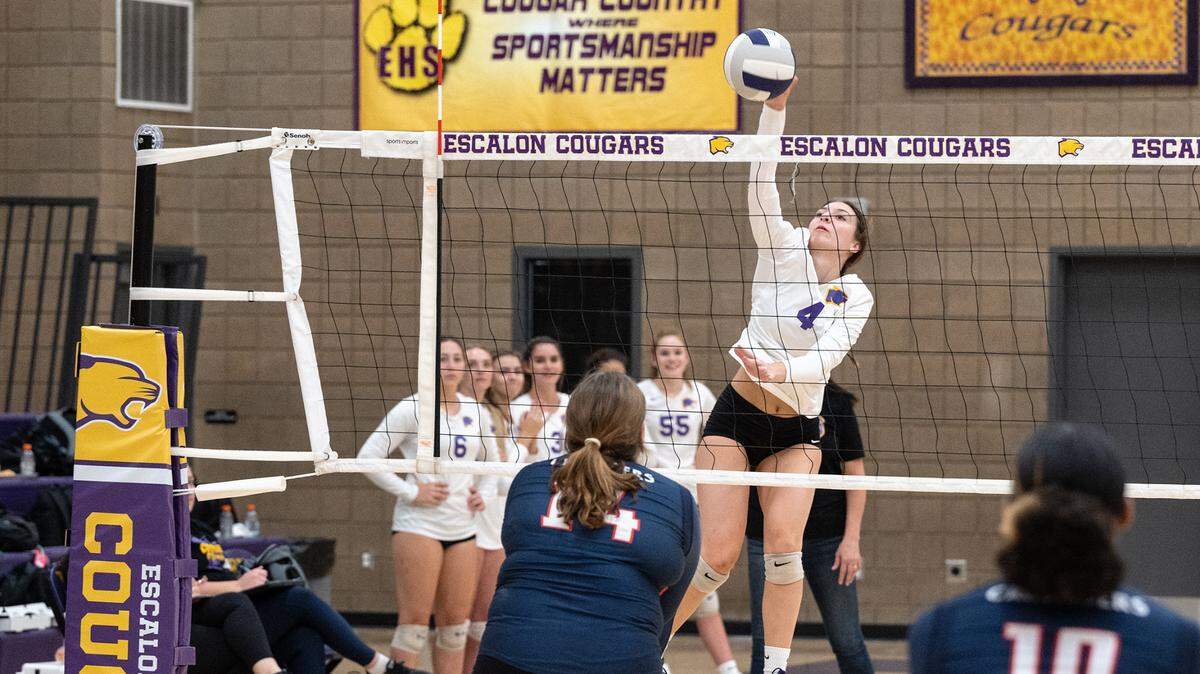 Escalon’s Gianna Bava strikes the ball during the non-league match with Modesto Christian in Escalon, Calif., on Wednesday, September 7, 2022. Escalon won 3-0.