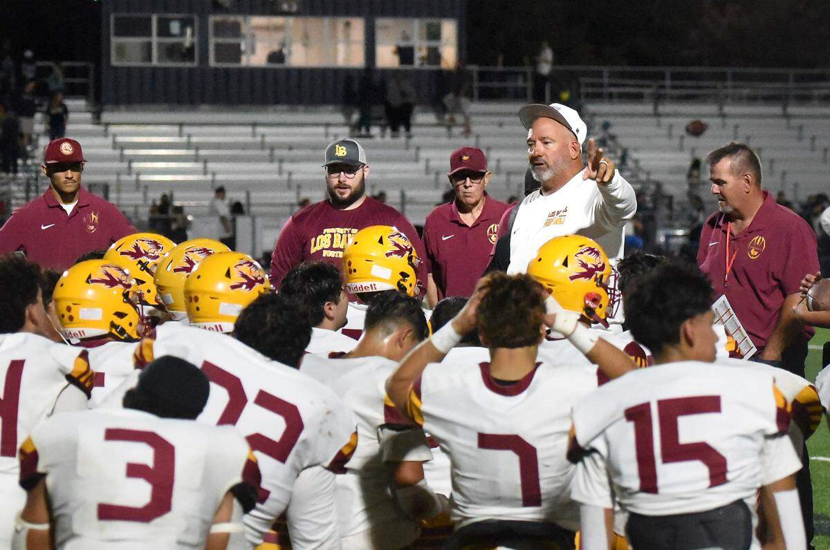 Los Banos head coach Dustin Caropreso addresses his team after a win over Gregori.