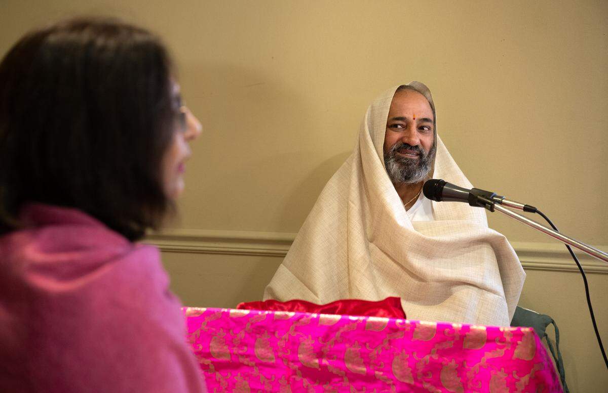 Hindu priest Naveen Sharma, right, speaks through translator Vidhu Mehra at the Hindu Temple and Community Center of Modesto on College Avenue in Modesto, Tuesday, Jan. 7, 2024.