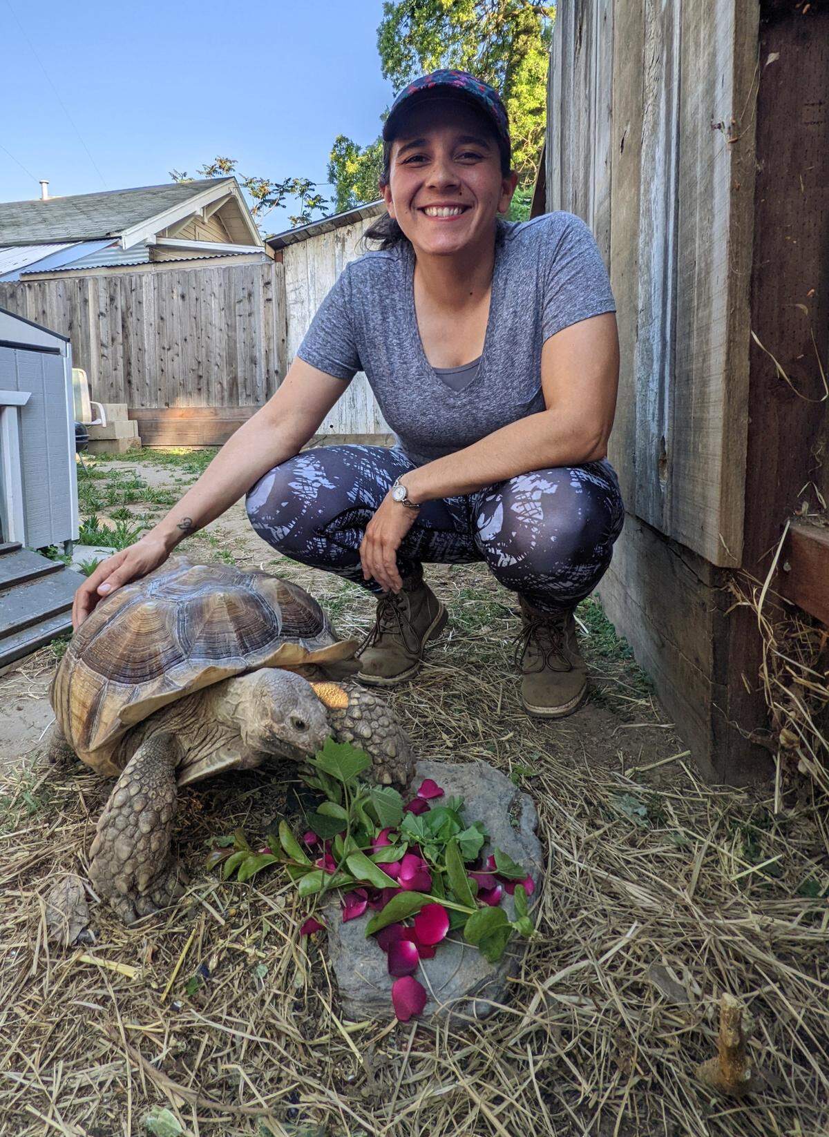 Rebecca Goulet is pictured with her tortoise, Squirt. They were reunited April 11 after Squirt escaped more than two weeks earlier.
