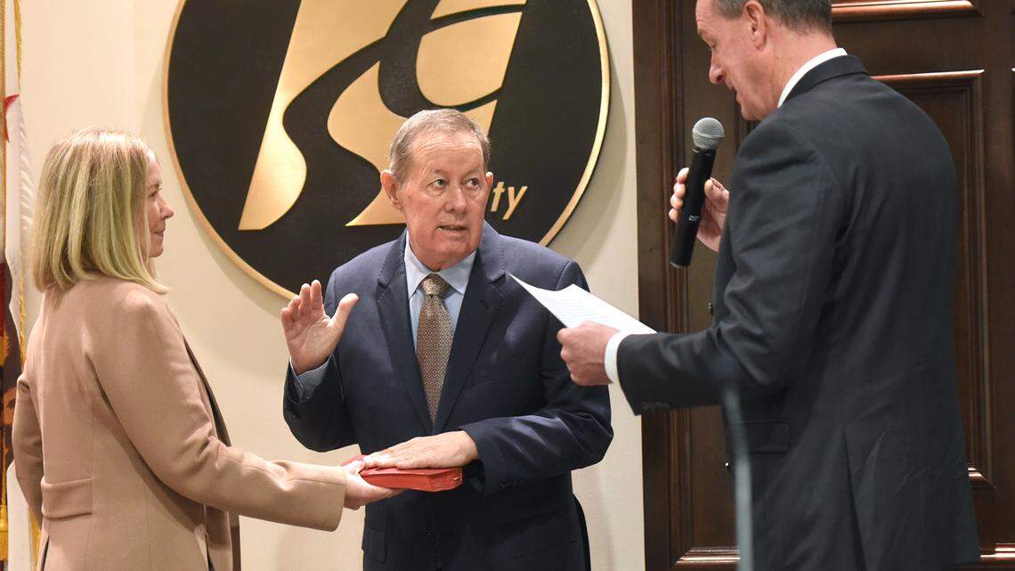 Stanislaus County supervisor Tom Berryhill (center) is sworn in Wednesday afternoon January 9, 2019 by supervisor Terry Withrow in the basement chambers of 10th Street Place in Modesto, Calif. Berryhill’s wife Loretta is pictured at left.