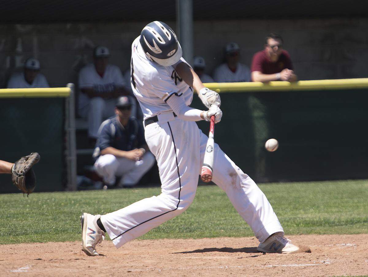 Central Catholic’s Connor Semone connects for a base hit during the Mark Dickens Tournament game with Beyer at Gregori High School in Salida, Calif., Tuesday, April 23, 2019. 