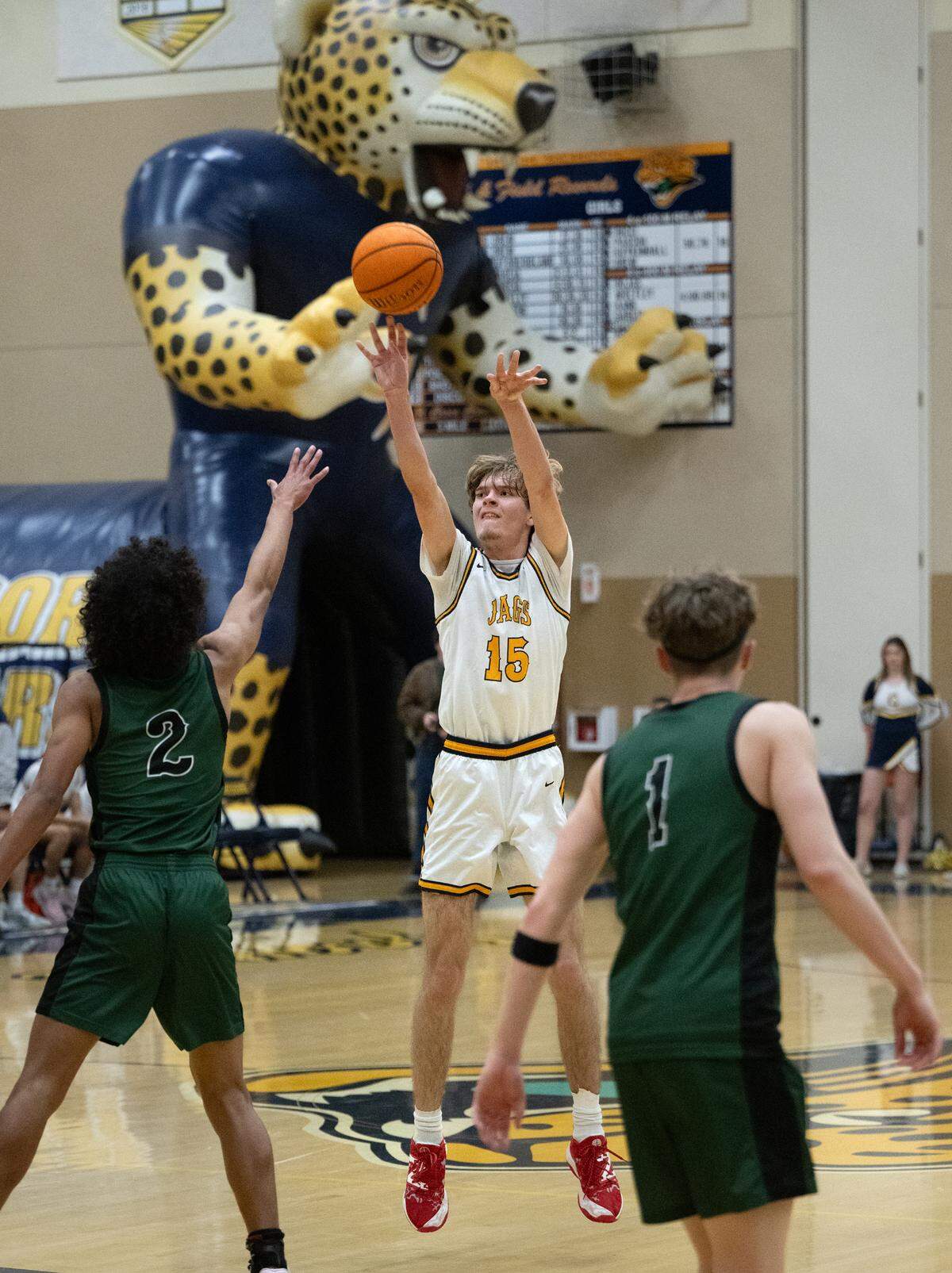 Gregori’s Jayson Powers shoots a three point shot during the Central California Athletic League game with Pitman at Gregori High School in Modesto, Wednesday, Feb. 12, 2025.