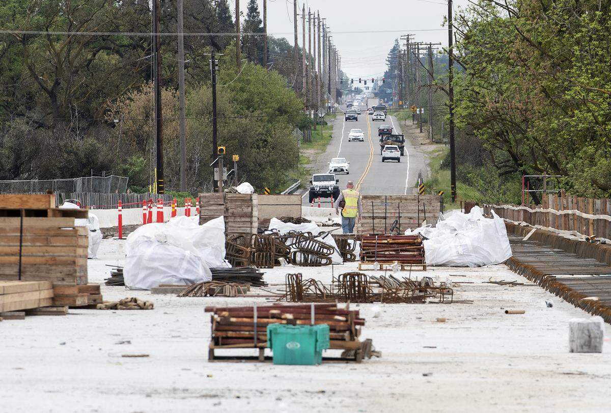 Work continues of the bridge over the Stanislaus River on McHenry Avenue in Modesto, Calif., Thursday, April 4, 2019. 