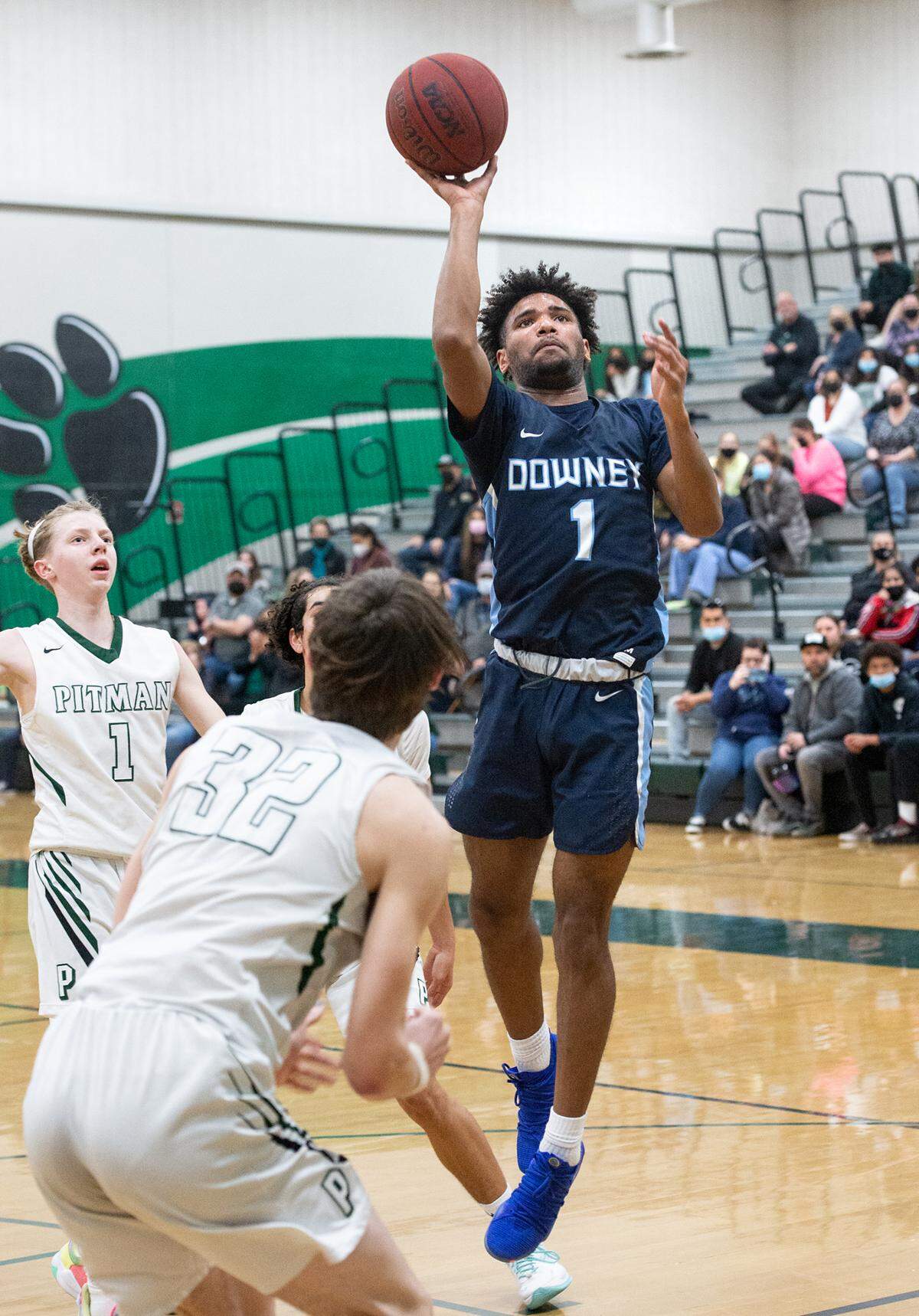 Downey’s Jorden Lewis shoots a jump shot during the Central California Athletic League game at Pitman High School in Turlock, Calif., on Friday, Feb. 4, 2022. Downey won the game 56-52.