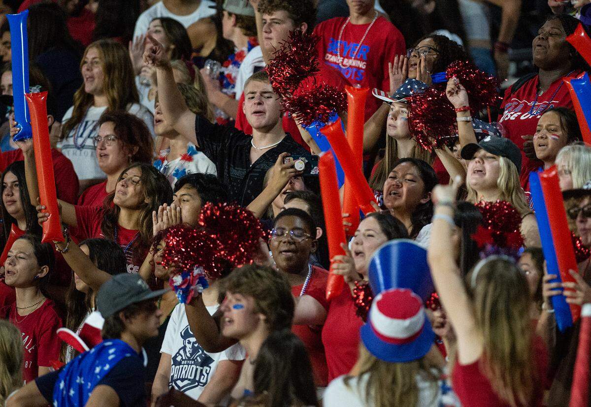 Beyer fans cheer their team during the Sylvan Bowl at Downey High School in Modesto, Calif., on Friday, August 19, 2022.
