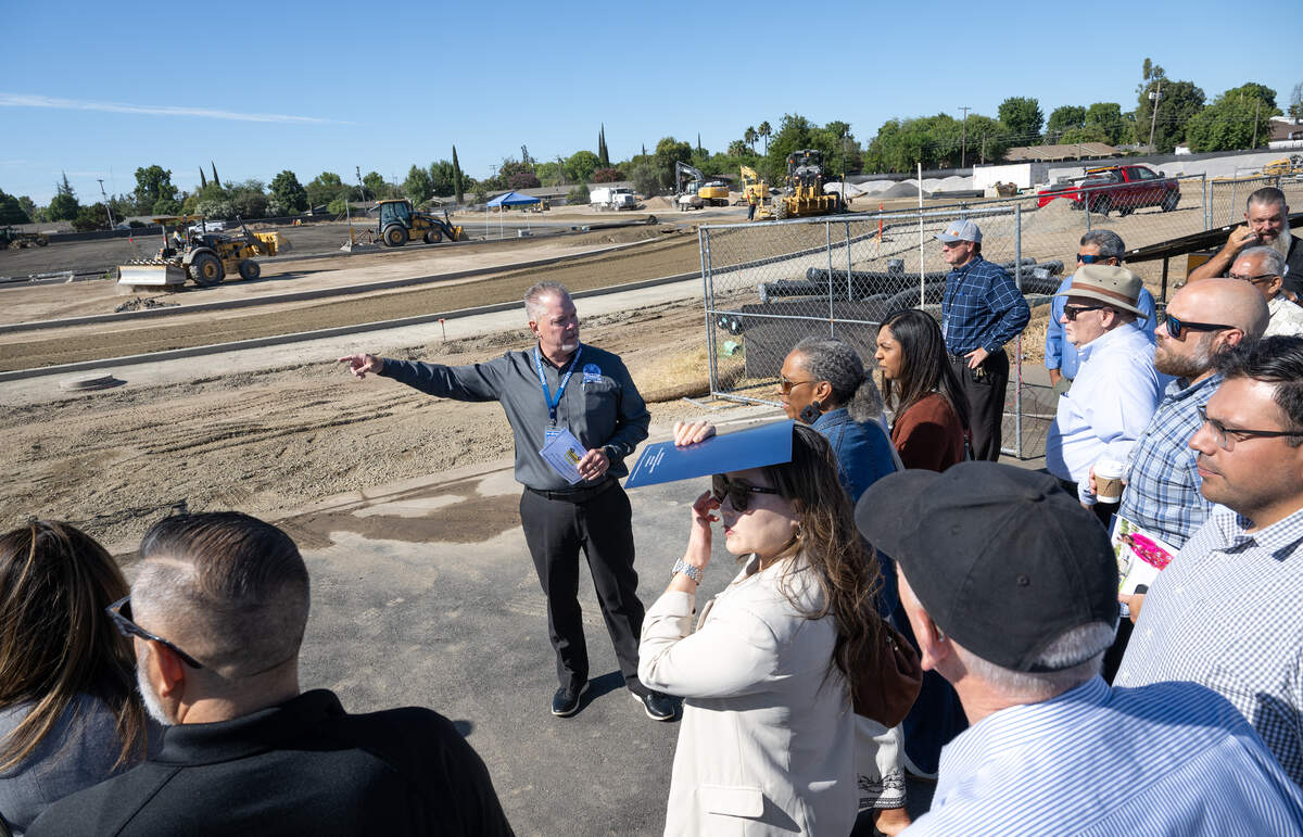 Modesto City Schools Associate Superintendent Tim Zearley shows the progress of construction of the new athletic stadium at Davis High School during facilities tour in Modesto on Monday, Aug. 4, 2025.