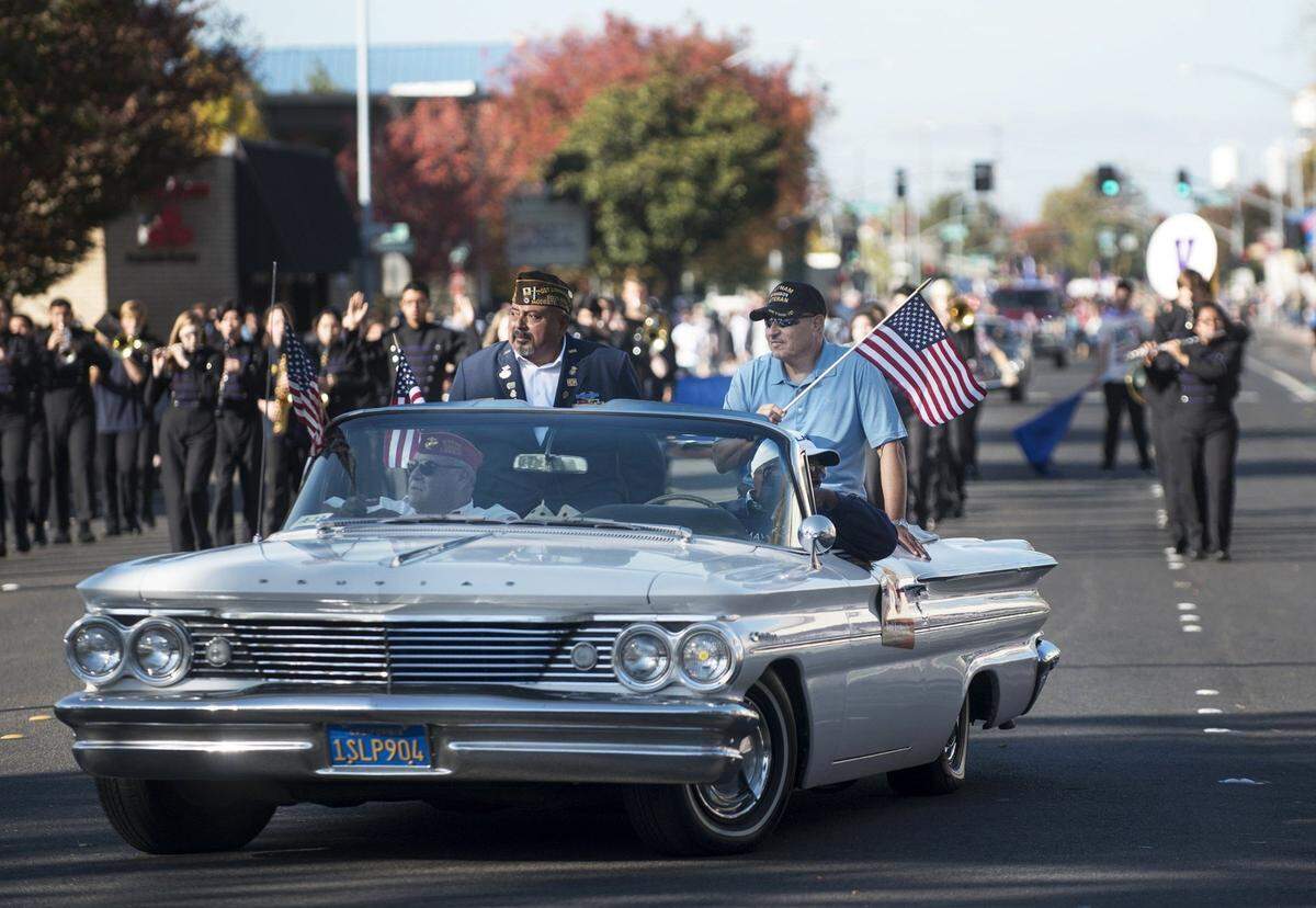 Vietnam Veterans lead the 2017 Modesto Veterans Day Parade on Needham Street in Modesto.