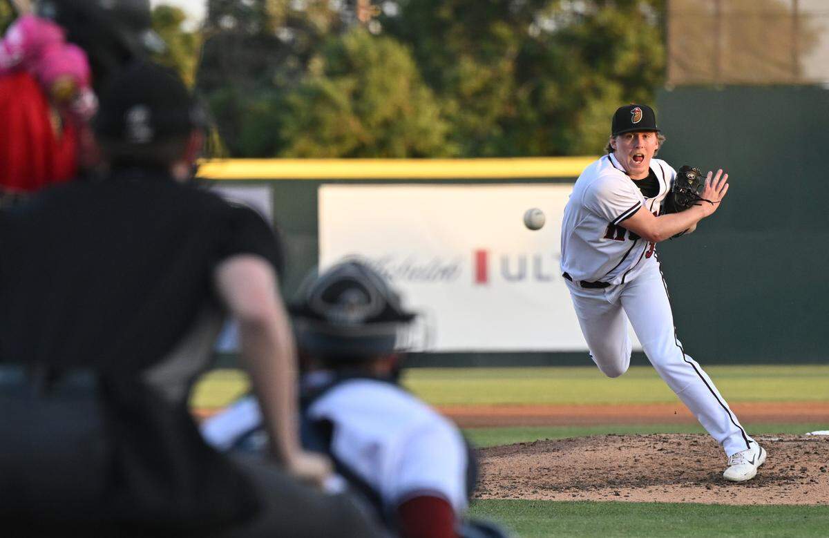 The Modesto Nuts pitcher Tyler Cleveland throws with a sidearm delivery during a game with the Fresno Grizzlies at John Thurman Field in Modesto, Calif., Thursday, June 22, 2023.