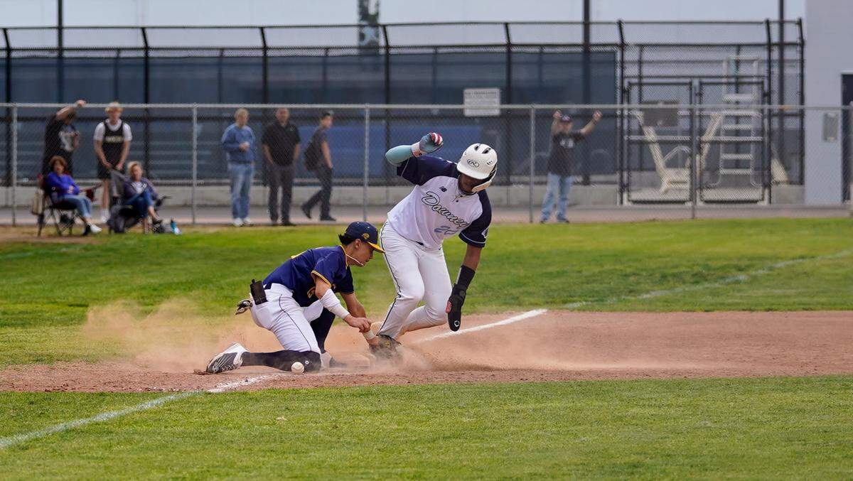 Downey’s Jayceon Sloan slides into third in a CCAL game against Gregori High at Downey High School in Modesto, Calif. on Wednesday, April 16, 2025.