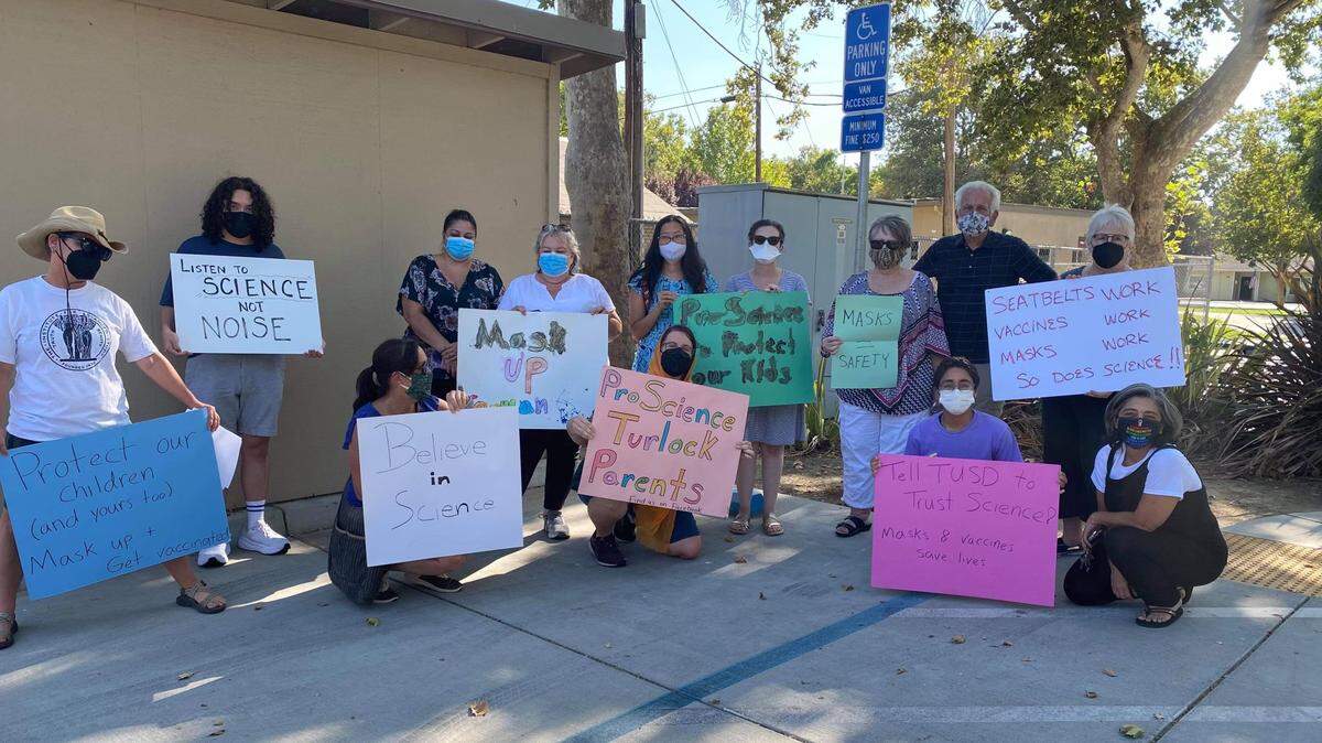 Members of the group Pro-science Turlock Parents turned out at the Turlock Unified School District board meeting Monday evening to urge the district not to challenge the state’s mask mandate.