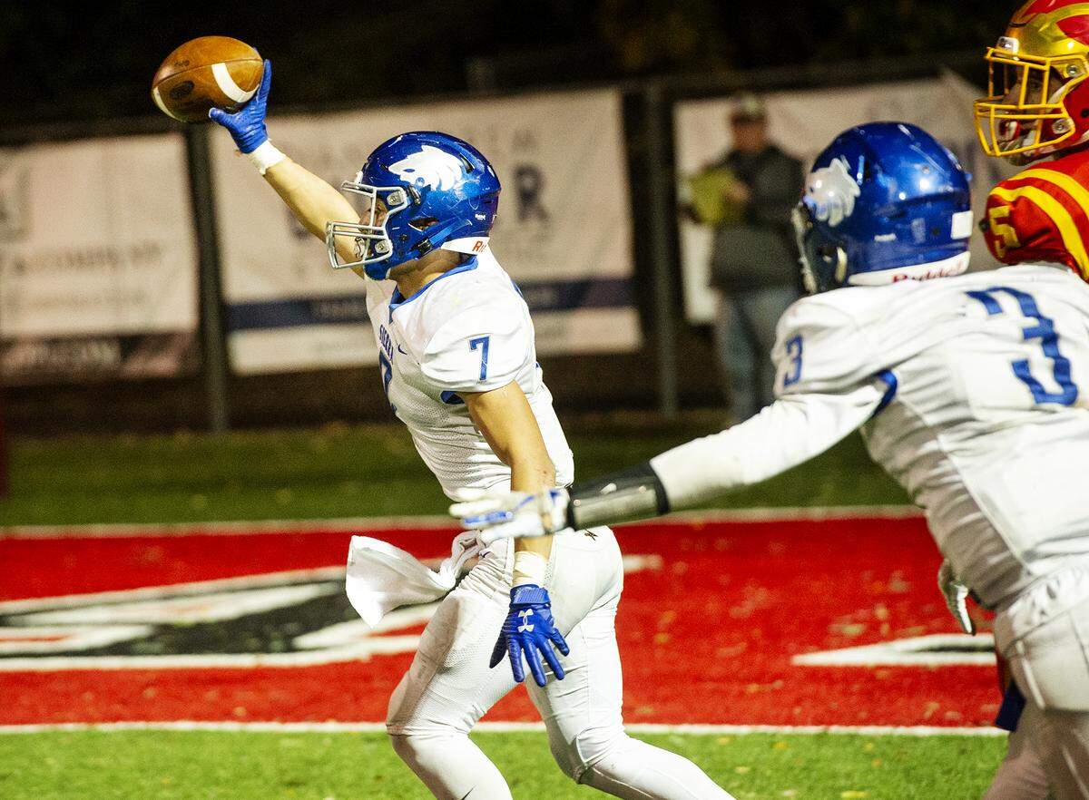 Sierra’s Nyco Mendoza intercepts the ball Oakdale during the Sac-Joaquin Section Division 4 title game at Lincoln High School in Stockton, Calif., Saturday, Nov. 30, 2019. Sierra won the game 22-19.