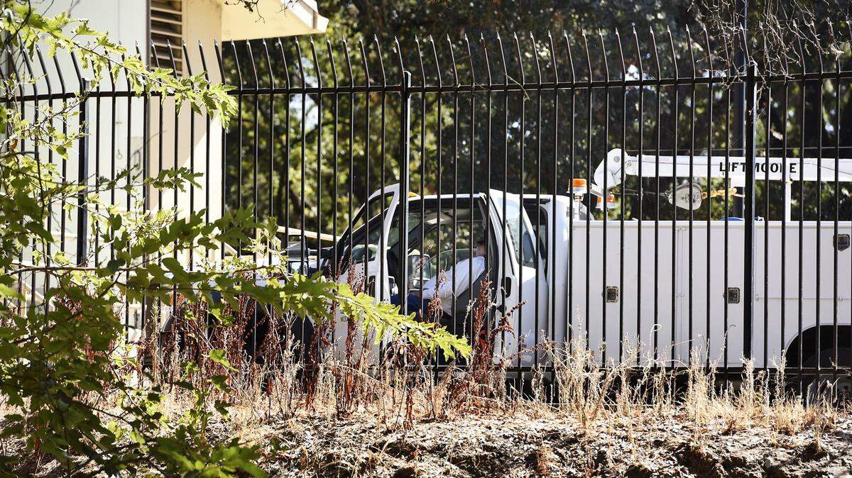 City workers were observed apparently taking an extended lunch break at the sewer lift station in Dry Creek Park in Modesto, Calif.,  on Oct. 12, 2016.