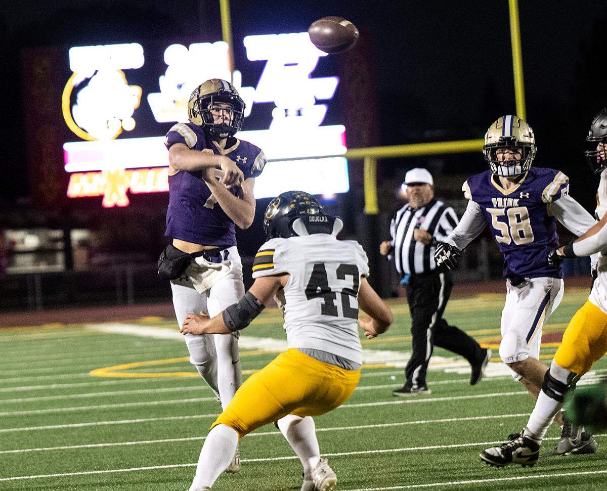Bradshaw Christian quarterback Ethan Rickert makes a pass during the Sac-Joaquin Section Division VI championship game with Hughson at Sacramento City College in Sacramento, Calif., Saturday, Nov. 25, 2023.