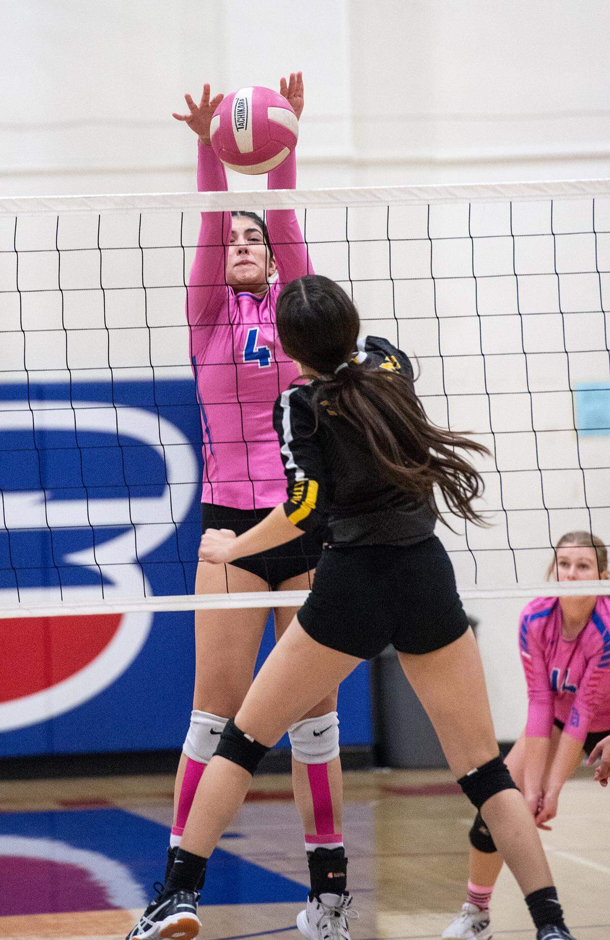 Beyer’s Maya Gonzalez blocks the shot of a Lathrop’s Liliana Navarro during the Western Athletic Conference match at Beyer High School in Modesto, Calif., Tuesday, Oct. 4, 2022. Beyer won 3-0.