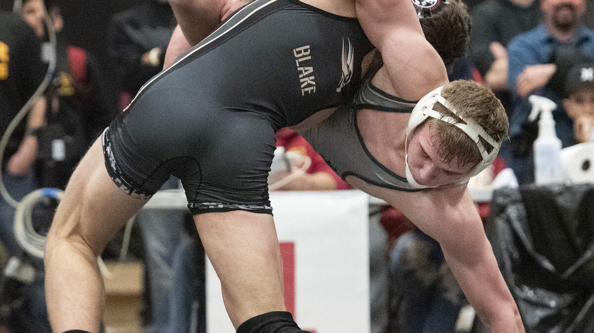 Del Oro’s Noah Blake flips Pitman’s Kendall La Rosa in the 160-pound championship match during the CIF Sac-Joaquin Section Masters Wrestling Meet at Delta College in Stockton, Calif., Saturday, Feb. 16, 2019.