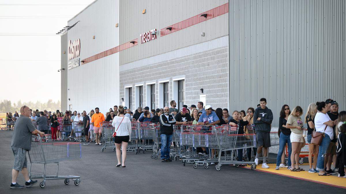 Costco members line up for the grand opening of the warehouse store in Riverbank on June 13, 2024.