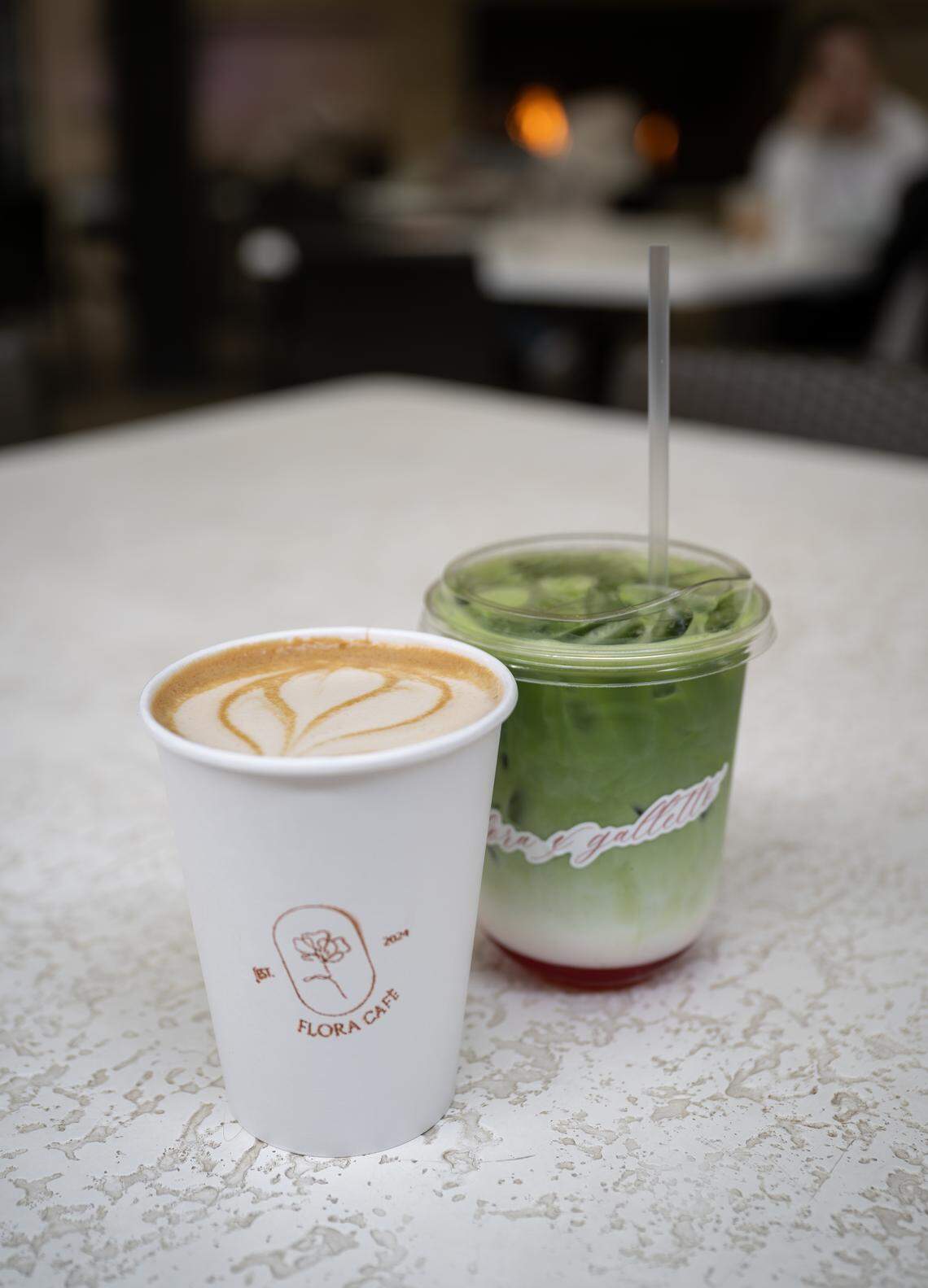 A cinnamon roll latte and strawberry matcha at Flora Cafe at Galletto on J Street in Modesto on Thursday, Nov. 20, 2025.