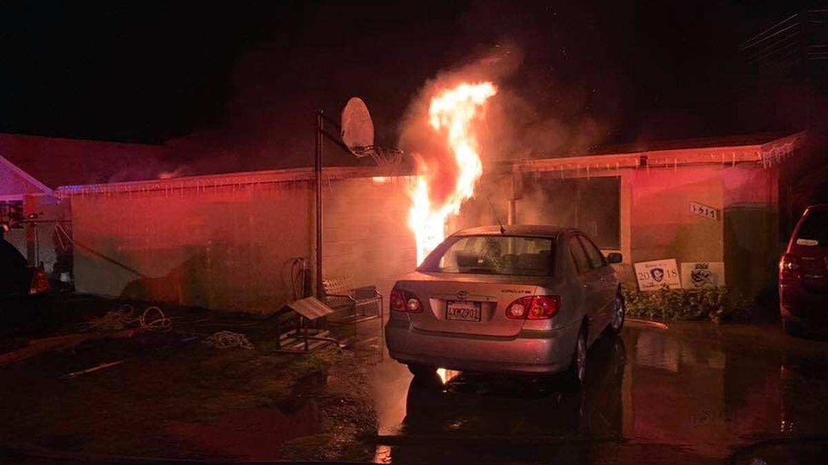 A fire burns a house in the 1500 block of Marin Avenue in the early hours of Monday Jan. 7, 2019, in south Modesto, California
