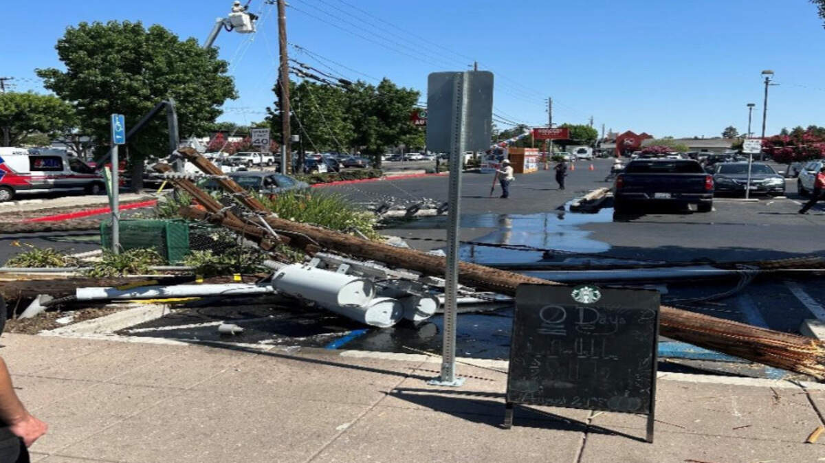 A delivery truck pulled down power lines at a shopping center on Oakdale Road in Modesto on Monday, June 30, 2025.