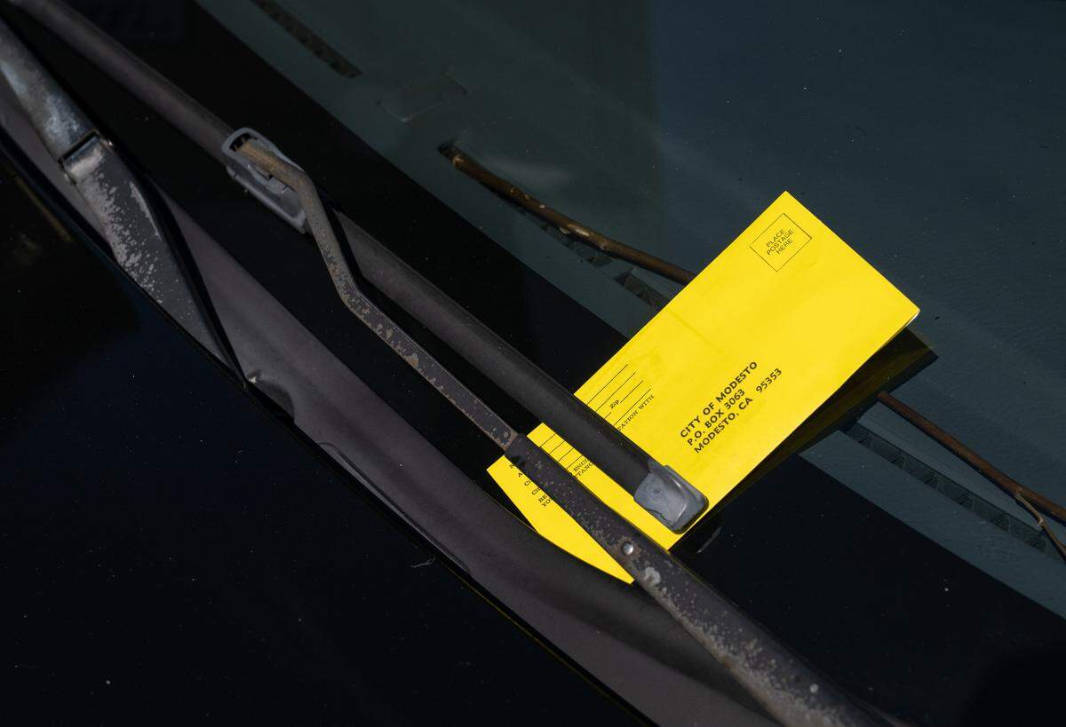 A parking ticket on a vehicle on 10th Street in Modesto on Tuesday, Sept. 27, 2023. 