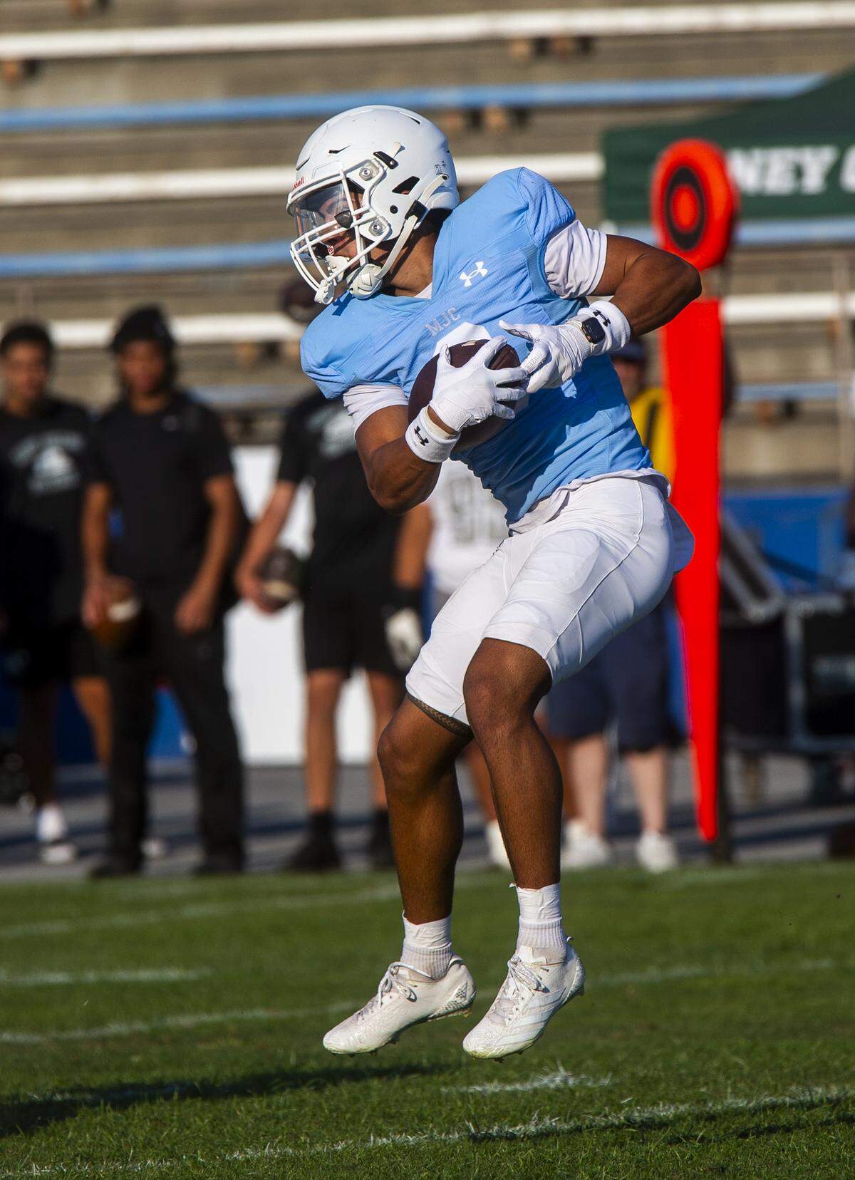 Modesto JC wide receiver Xzavier Clark, 0, catches a pass during the first half of a nonconference game against Laney College at Modesto Junior College on Saturday, Aug. 30, 2025.