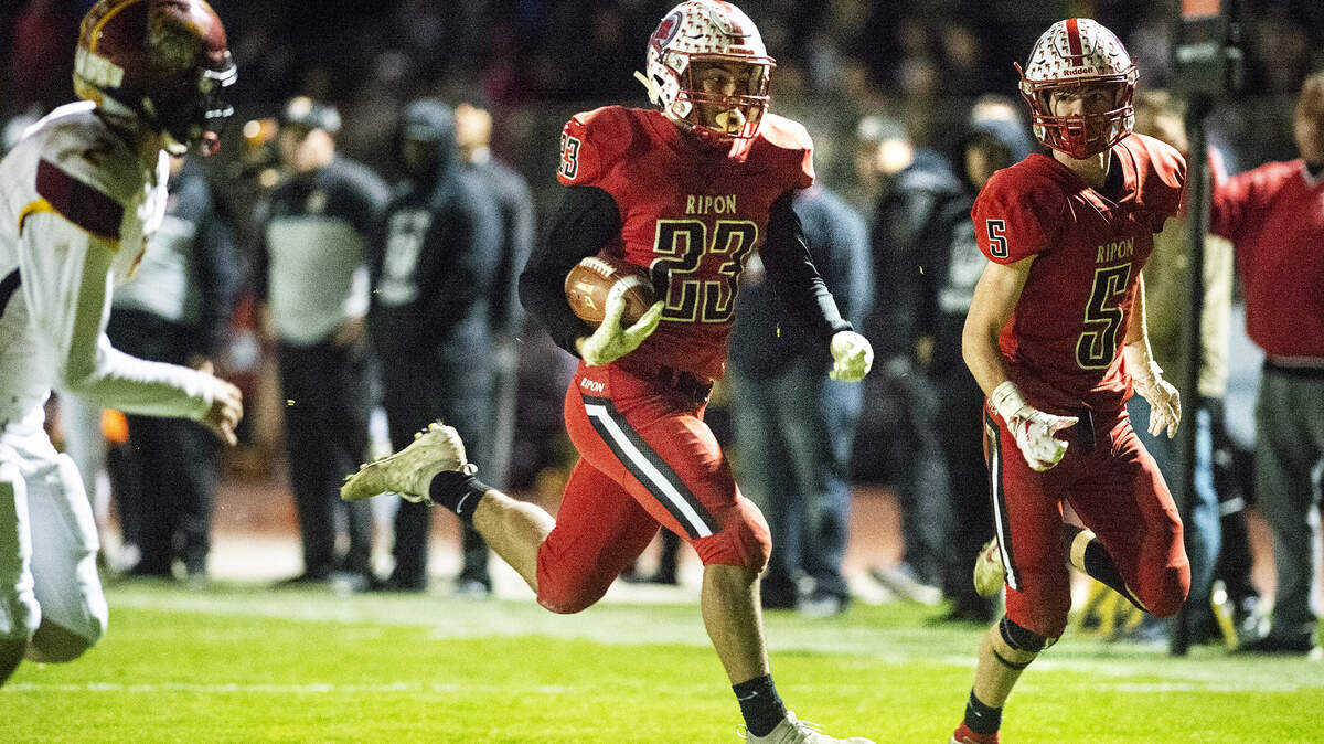Ripon’s Danny Hernandez returns an interception for a touchdown during the CIF State 4-AA championship game at Ripon High School in Ripon, Calif., on Saturday, Dec. 14, 2019.