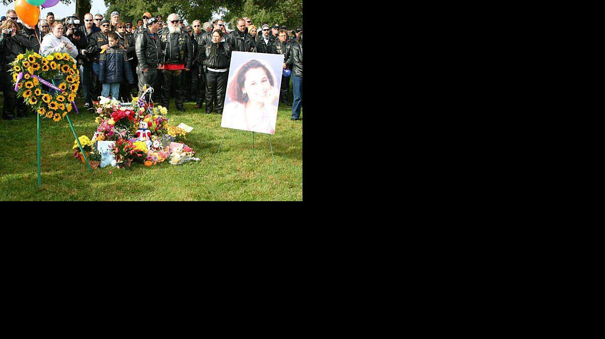 Participants of the 2006 Laci & Conner Memorial Ride gather at their graveside in Burwood Cemetery near Escalon. Contributed by Laci's cousin, Shawn Rocha.