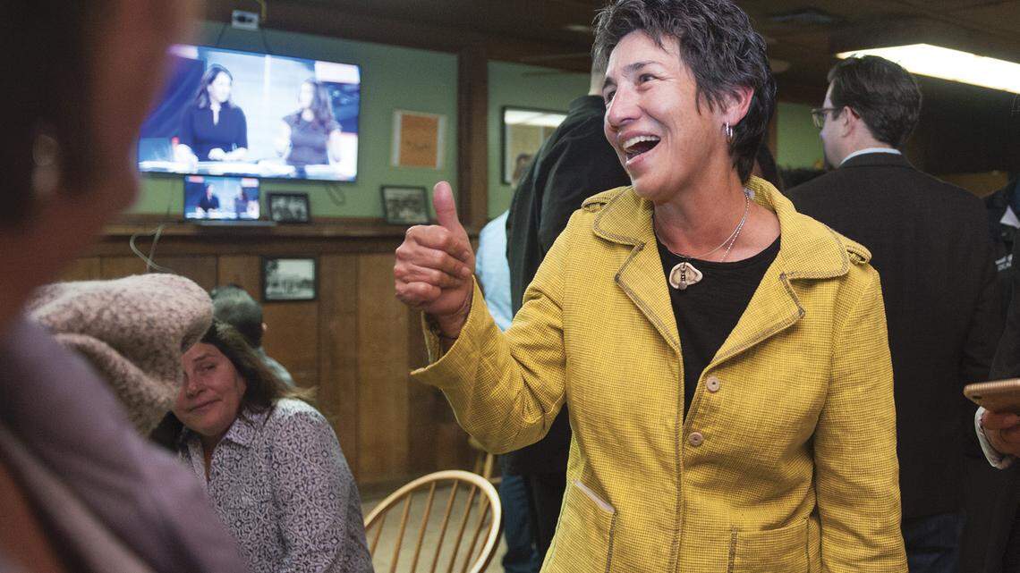 Susan Talamantes Eggman, who is running for State Senate, gives a thumbs up after she sees the early results at her election party in Stockton Tuesday, March 3, 2020.