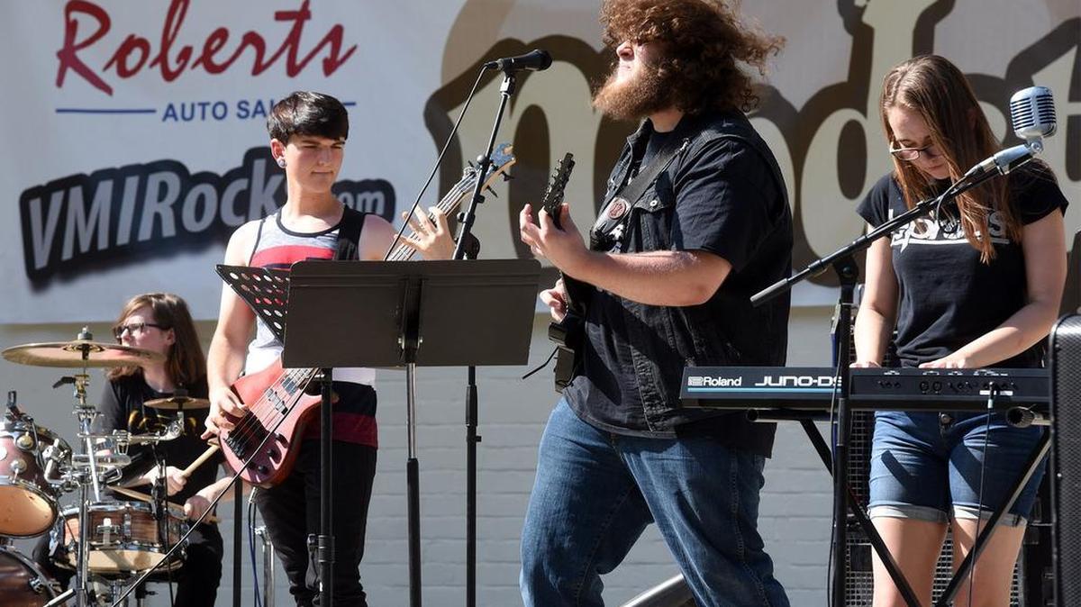 From left to right- Noah Martin, Erik Bloomfield and Kyra McNeil of the Heralds of Doom play Modstock Sunday afternoon August 12, 2018 in Mancini Bowl at Graceada Park in Modesto, Calif.