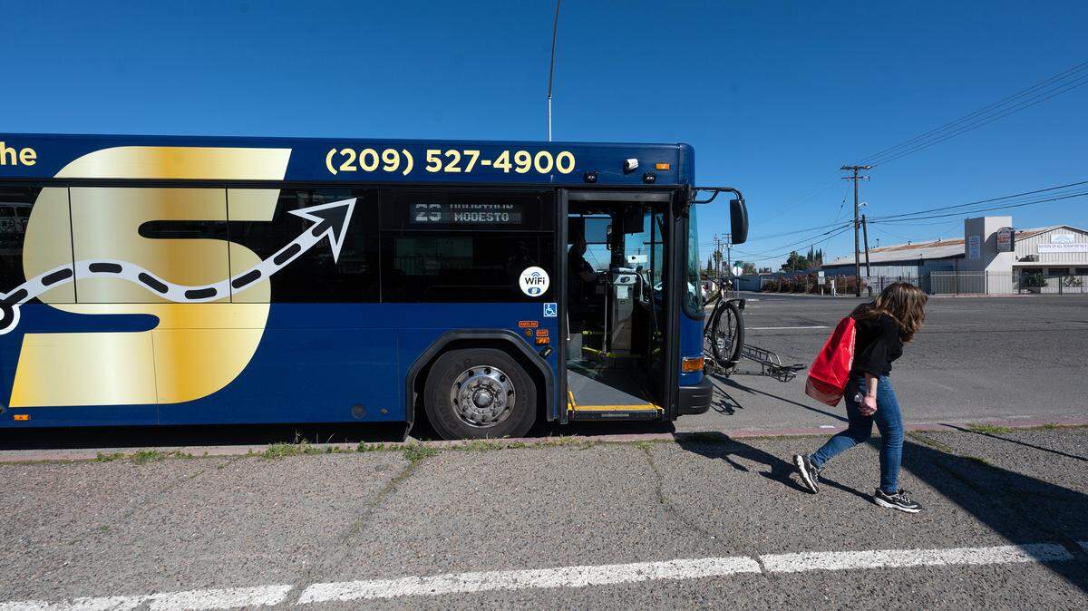 A rider gets off a StanRTA bus on South Ninth Street at Hosmer Avenue in Modesto, Calif., Saturday, March 16, 2024.
