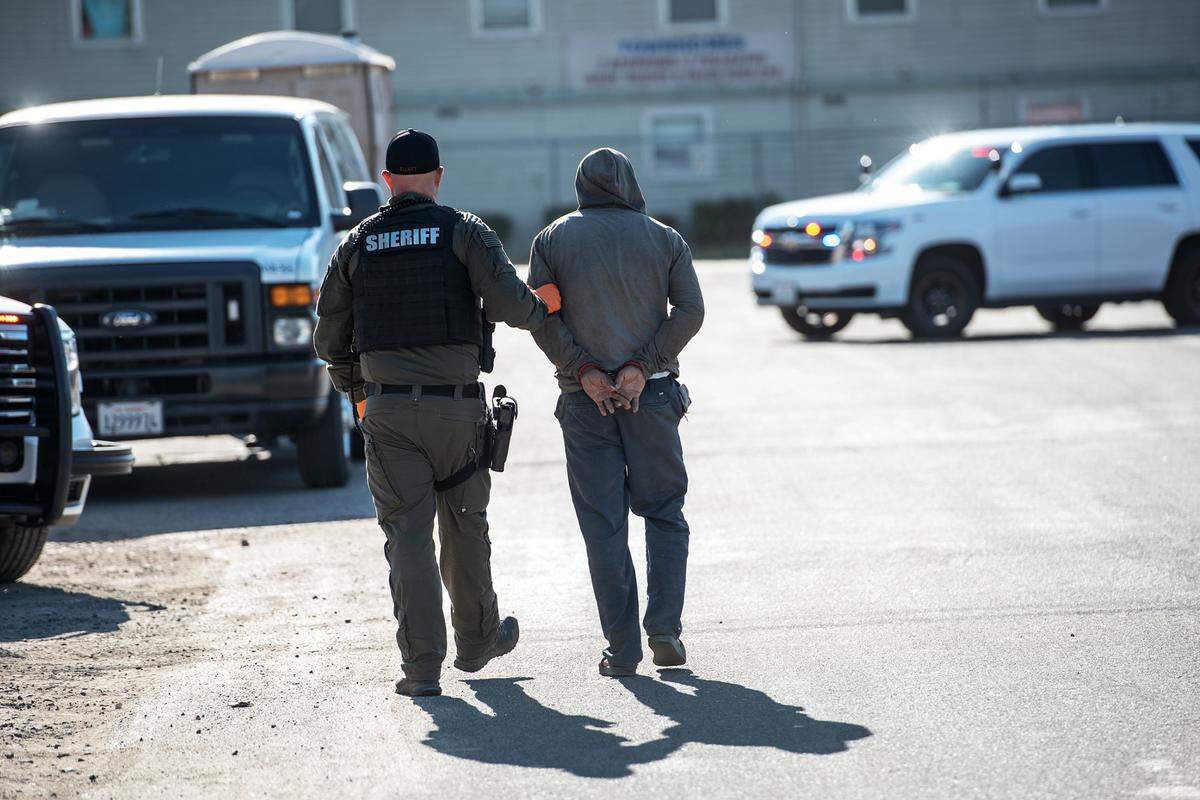 A Stanislaus County Sheriff’s deputy makes an arrest in 2021.