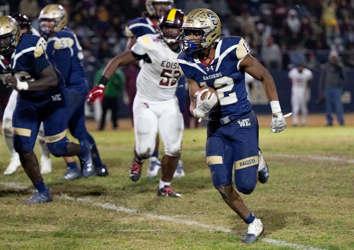 Central Catholic’s Joey Alcutt runs the ball during the Sac-Joaquin Section Division I quarterfinal game with Edison at Central Catholic High School in Modesto, Calif., Friday, Nov. 10, 2023.
