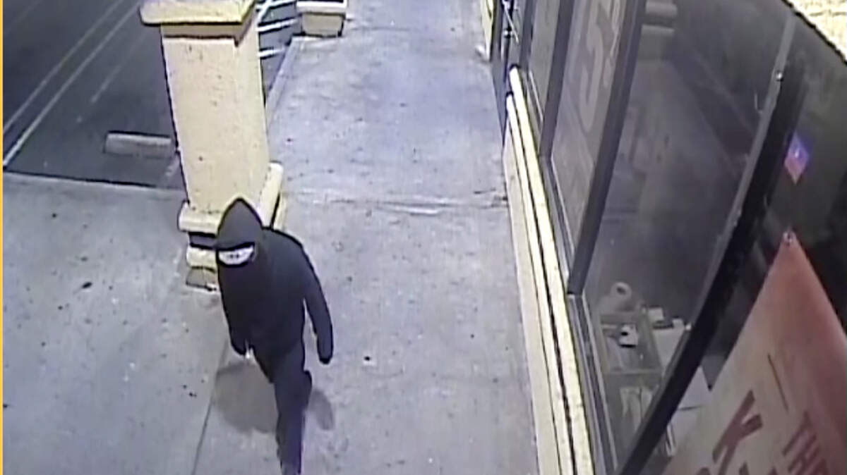 The suspect at FYE Music on McHenry Avenue on Jan. 9, one of five locations he is suspected of burglarizing or trying to burglarize.