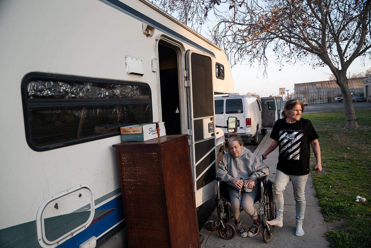 Sheryl Bremen and her daughter Tiffany Rasnic are living in their RV at Broadway Park in Turlock, Calif., on Wednesday, Feb. 9, 2022. Bremen is hoping to move into a home and continue care for her daughter who lost her sight several years ago.