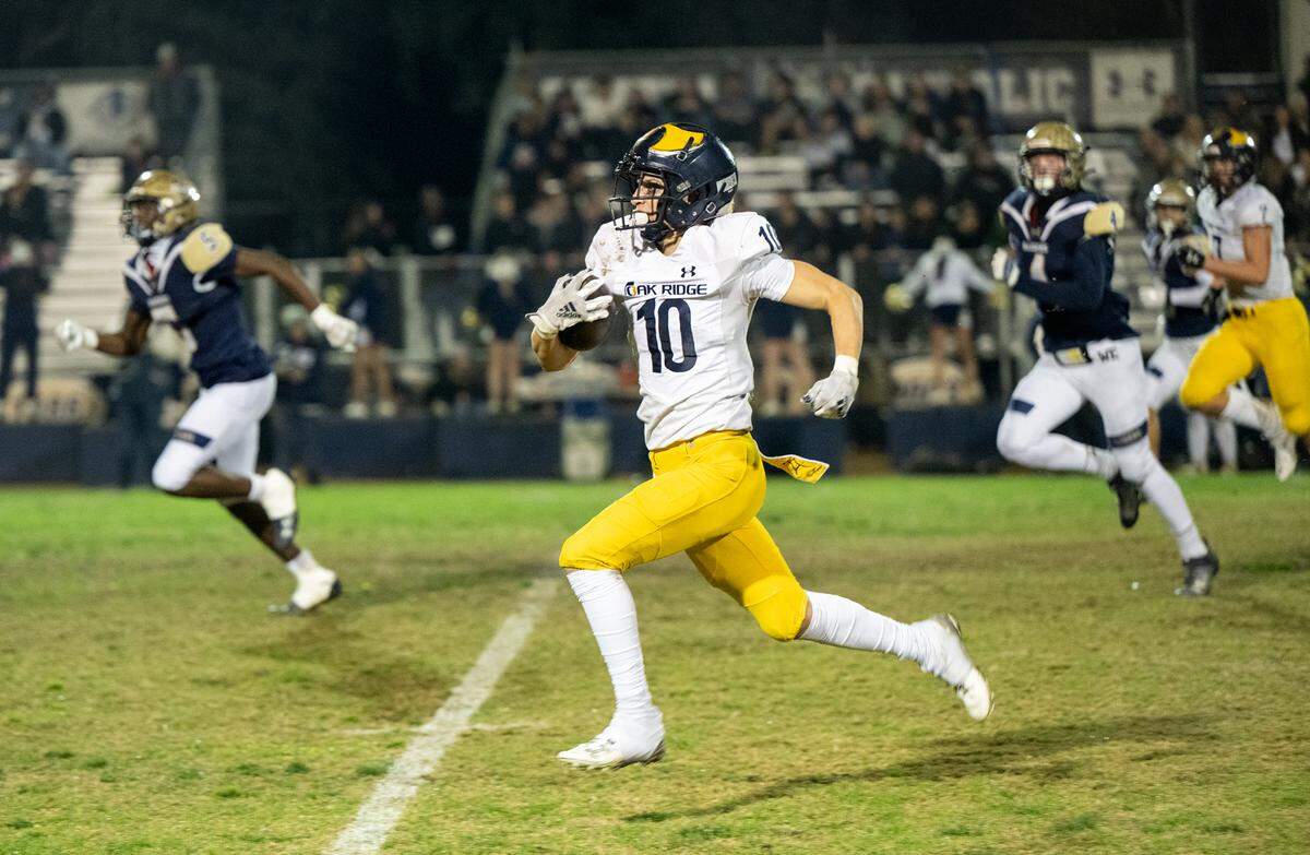 Oak Ridge’s Jasen Womack breaks free on a touchdown run during the Sac-Joaquin Section semifinal playoff game with Central Catholic at Central Catholic High School in Modesto, Calif., Friday Nov. 17, 2023. Oak Ridge won the game 31-14.