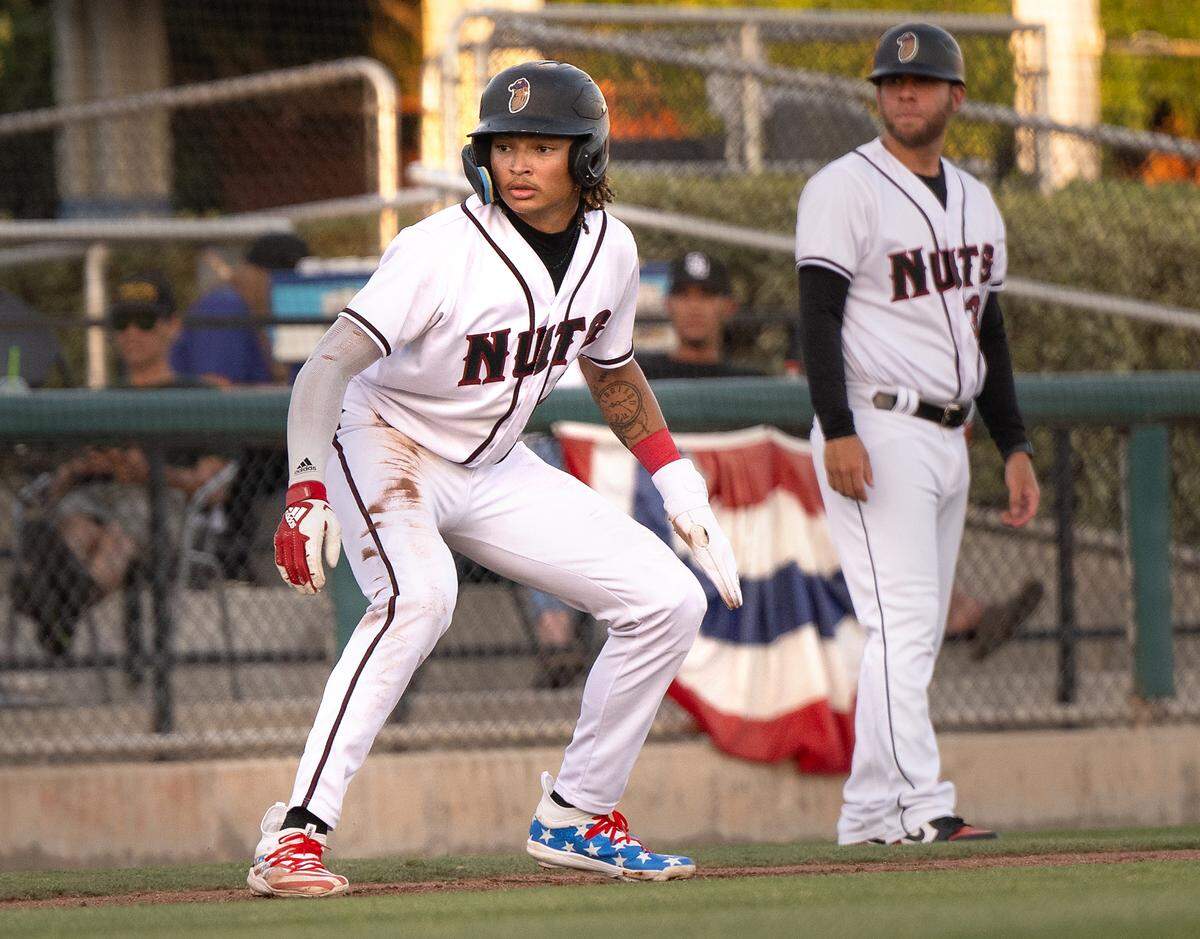 Modesto’s Tai Peete leads off third base during the game with Fresno at John Thurman Field, in Modesto, Calif., Wednesday, July 3, 2024. Modesto won the game 6-3.