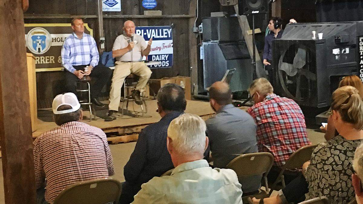 Rep. Jeff Denham, left, and U.S. Agriculture Secretary Sonny Perdue take questions from the audience on  Aug. 14, 2018 in the Durrer barn near Salida. Denham moved to the Central Valley last decade from Salinas, which he represented in the state Senate.